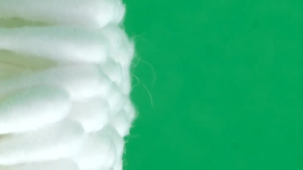 Cotton Swabs Green Background Chromakey Background Close Vertical Video — Stock Video