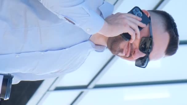 Director Makes Phone Call While Standing Glass Office Confident Bearded — Stock Video