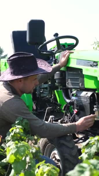 Young Farmer Repairing Mini Tractor Middle Field Rural Worker Field — Stock Video