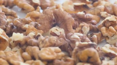 Kuru ceviz arkaplan, fındığı kapat, dönüş. Yemek arkaplanı. Tarifler ya da vejetaryen yemekleri için..