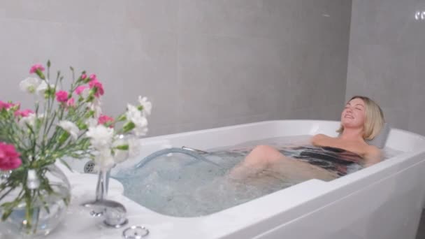 Beautiful Woman Relaxes Bath Hydromassage Therapy Spa — Stock Video