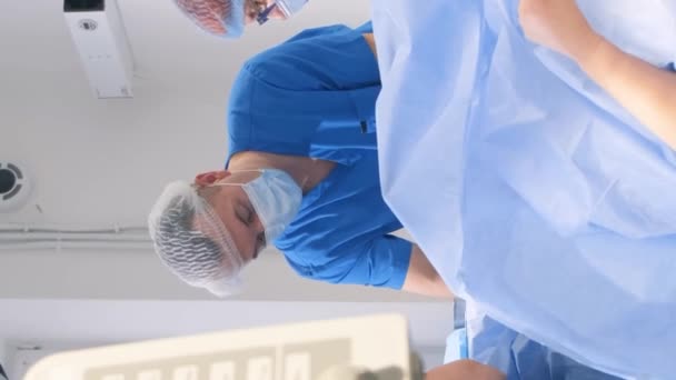 Team Surgeons Operation Remove Leg Veins Using Surgical Laparoscopy Instruments — Stock Video