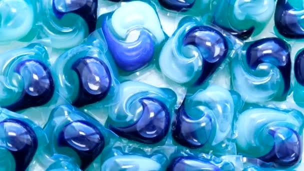 Hermoso Patrón Cápsulas Lavandería Azul Azulado Eléctrico Que Asemeja Una — Vídeos de Stock