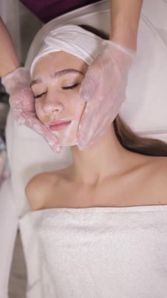 Woman Receiving Facial Treatment Spa Focusing Her Cheek Eye Eyelash — Stock Video