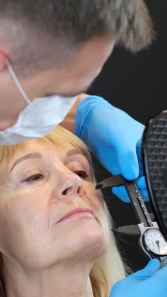 Woman Undergoes Ear Measurement Dentist Who Checks Her Facial Features — Stock Video