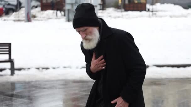 Old Grandfather Had Heart Attack While Standing His Winter Outerwear — Stock Video