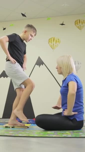 Medical Center Specialist Helps Boy Recover Injury Professional Physiotherapist Helps — Stock Video