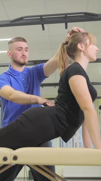 Concept Rehabilitation Restoration Health Young Woman Performs Exercises Supervision Physiotherapist — Stock Video