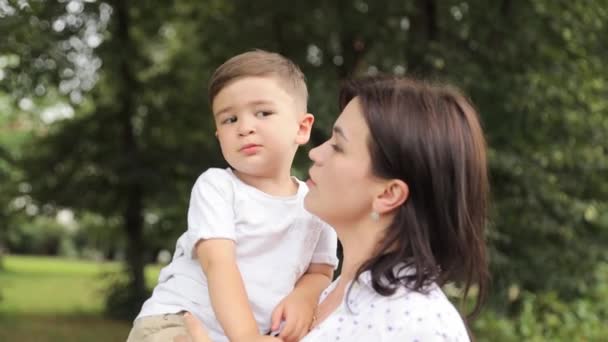 Woman Sharing Happy Moment Little Boy Her Arms Surrounded Trees — Stock Video