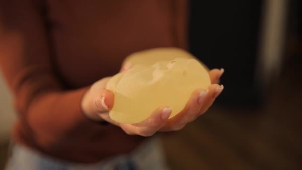 Close Two Breast Silicone Implants Woman Selection Silicone Implants Breast — Stock Video