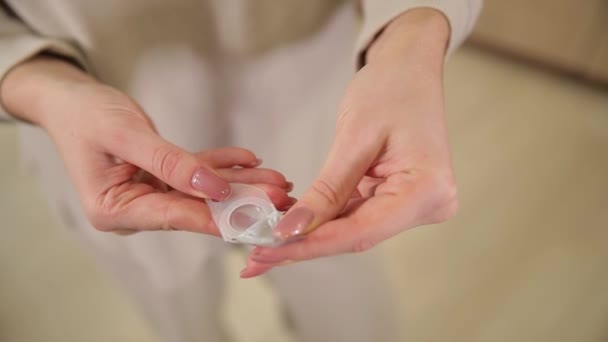 Close Fragile Female Hand Holding Lens Selection Optical Means Improve — Stock Video