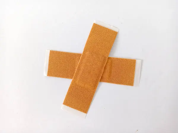 photo of band aid plester, as a first aid tool, image taken in studio on white background