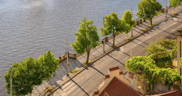 Spring Day Over Vltava: Elevated View of Pragues Streets and Bike Path
