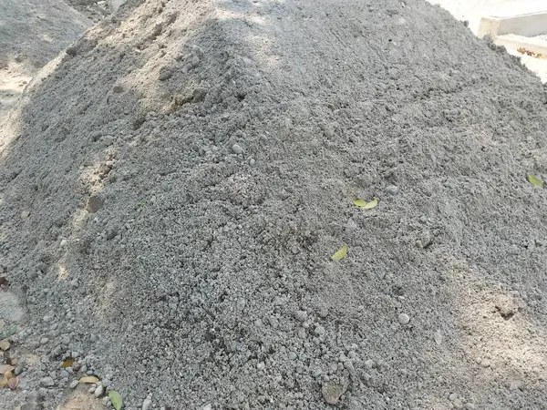a pile of sand at a construction project site. used for concrete castings as fine aggregate. Sand is used for castings, plastering and filling