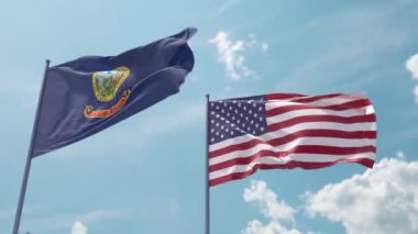 Idaho bayrağı ve ABD bayrağı bayrak direğinde güçlü bir rüzgar üzerinde mavi gökyüzünde ekran koruyucu veya giriş olarak dalgalanır. Idaho Eyaleti ve Amerika Birleşik Devletleri