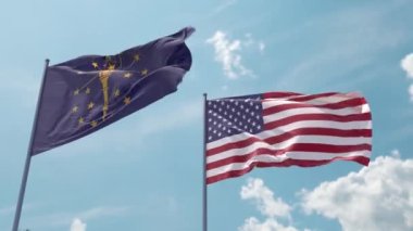 Indiana bayrağı ve ABD bayrağı mavi gökyüzünde güçlü bir rüzgarda dalgalanan bayrak direğinde ekran koruyucu ya da giriş olarak. Indiana Eyaleti ve Amerika Birleşik Devletleri