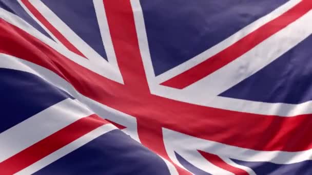 イギリスの国旗は バックグラウンドまたはイントロとして風に振り イギリス国旗は スロー3Dモーションアニメーションリアルです イギリス国旗4K決議 英国の国旗 閉じる — ストック動画