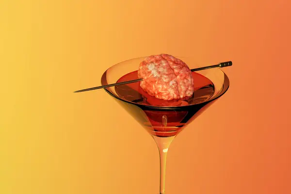 Red Cocktail Garnished Realistic Human Brain Silver Metal Pick Orange — Stock Photo, Image