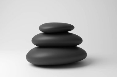 Küçük siyah yuvarlak çakıl yığını tek renk ve minimalizmde beyaz arka planda bir cairn oluşturuyor. Anılar, meditasyon ve rahatlama kavramının yansıması