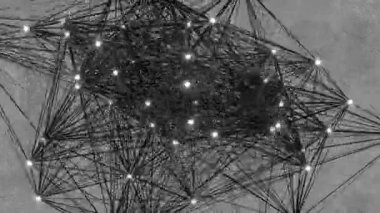 Parlayan beyaz noktaları birleştiren siyah çizgi beton duvar arka planında birbirine bağlı bir ağ ve pleksus oluşturuyor. Ağ oluşturma ve AI sinirsel ağ konuları için 3B döngü canlandırması