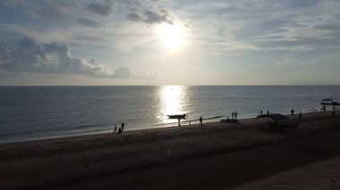 Güneş denizi yardığında, Batakan Sahili, Tanah Laut, Güney Kalimantan, Endonezya
