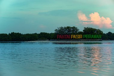 KEPULAUAN SERIBU - JAKARTA, APRIL 14, 2024. a beautiful landmark view of Pasir Perawan Beach early in the morning clipart