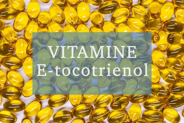 Capsules or tablets of vitamin E - tocopherol, tocotrienol. Nutritional supplements for health.