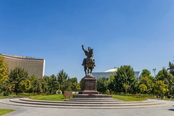 stock image Tashkent, Uzbekistan - August 15, 2023: Monument to Amir Timur on the central square with the complex - 