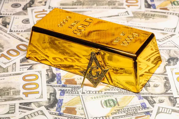 Gold and dollars concept of financial wealth and business success with Masonic sign.