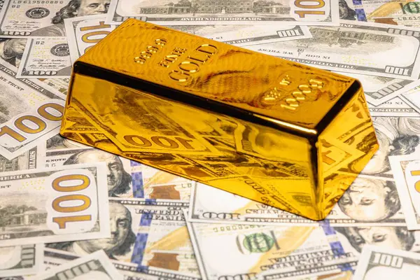 Gold and dollars concept of financial wealth and business success.