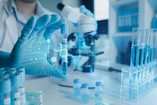 Deneylerin yapıldığı laboratuvarlardan biri, laboratuvarda bir bilim deneyi yürütülüyor, bilim adamı laboratuvarda kimyasallarla deney yapıyor..