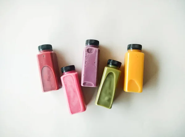 colorful of water bottles on the white background