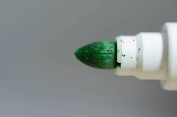 Extreme close up of the tip of a green felt tip pen