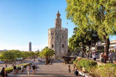 Sevilla, Spain; 10-24-2024: Famous monument Torre del Oro in Seville located on the promenade along the Guadalquivir River clipart