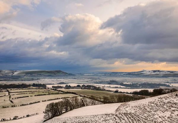 South downs snow covered winter wonderland between mount caburn and Firle beacon East Sussex south east England