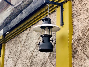 An old petromax lamp that was converted and utilized as a decorative lamp in the out door area. Adds a very interesting old atmosphere. clipart