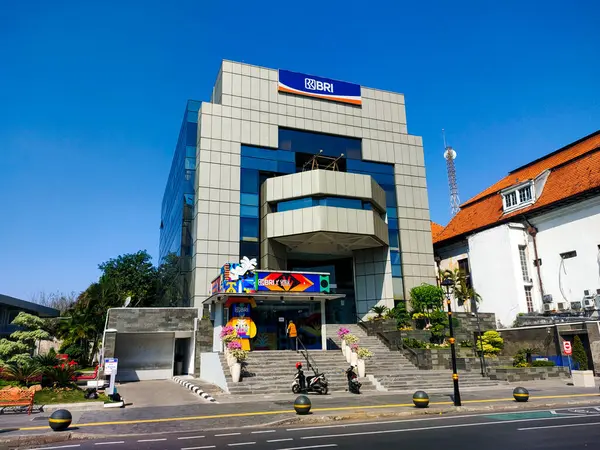 stock image Surabaya - Indonesia, July 20, 2024.Left Perspective view of the BRI Bank building, with a modern, simple, elegant style.