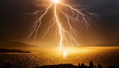 a golden flash of lightning against a dark backdrop, symbolizing the raw power and energy clipart