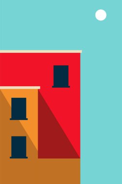 Parlak güneşli gökyüzü altında cesur geometrik şekillerle minimalist renkli bina cephesi