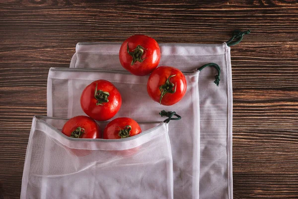 Top View Reusable Textile Shopping Bags Fresh Tomatoes Wooden Table — Stock Photo, Image