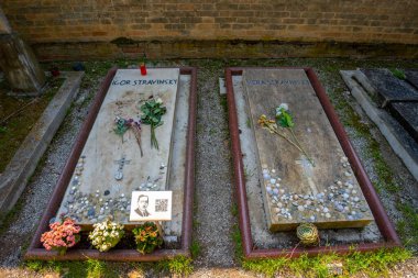 Venice, Italy - June 04, 2024: Tombstone of the Russian composer, Igor Stravinsky (1872-1971) and his wife Vera Stravinsky(1888-1982) in the cemetery San Michele. clipart