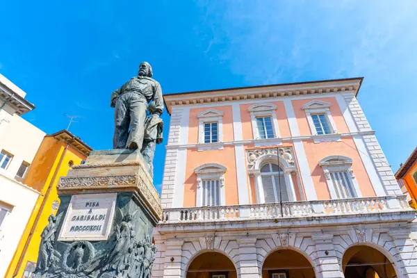 stock image Pisa, Italy - June 02, 2024: Giuseppe Garibaldi monument. Sunny day, clear sky. Bottom to top view.