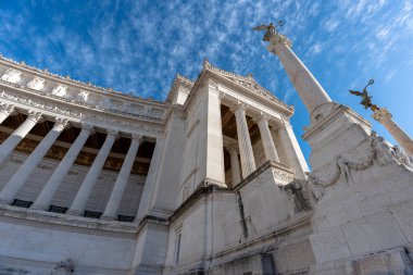 Rome, Italy - May 28, 2024: National Monument the Vittoriano or Altare della Patria, Altar of the Fatherland. Bottom to top view. clipart