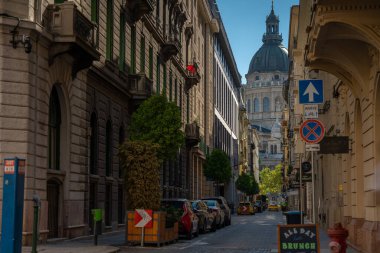 Budapest, Hungary - August 18, 2024: View to St. Stephen's Basilica from Lazar street. clipart