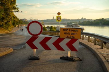 Budapest, Hungary - September 24, 2024: Blocked Carl Lutz RKP Road During Flood Cleanup After Storm Boris. clipart