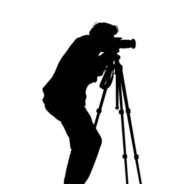 Fotoğrafçı fotoğraf makinesi tripod üzerinde kamera ile silüeti