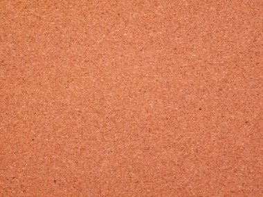 High-resolution image of a cork board surface showing natural, brown, slightly rough texture. Ideal for use as a background in presentations, projects, or as a design element for collage or office-themed visuals.