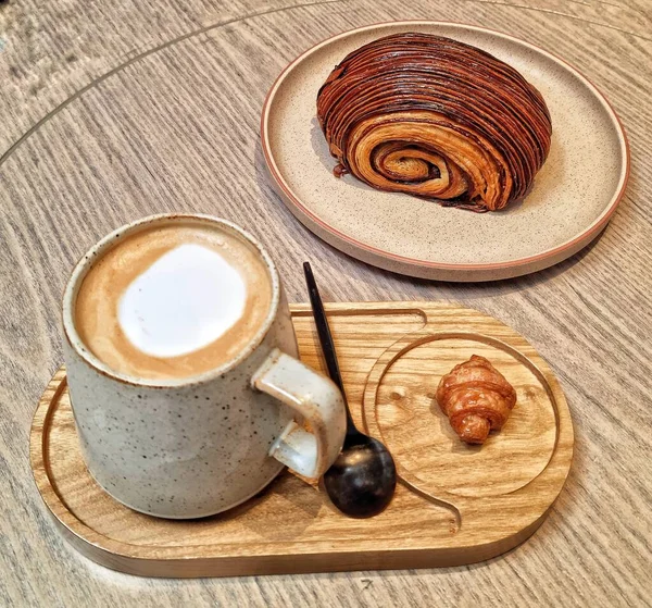 Breakfast set with cappuccino coffee and breakfast