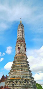 Bangkok, Thailand - Sept 14, 2024: The great stupa of Khao Klang Nok in Wat Arun Ratchawararam Ratchawaramahawihan clipart