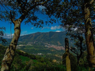 View from the road to the town or city, destination